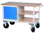 Mobile workbench with shelves and cabinet with hinged door