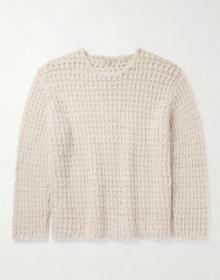 Sweater with difficult knitted pattern