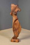 Sculpture of a woman made of natural wood