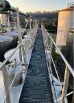 Stainless steel footbridge - Galvanised iron grating