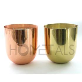 Large size candles in rose gold and golden candle containers