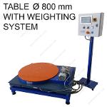Motorized rotary table for pallet wrapping with integrated scale